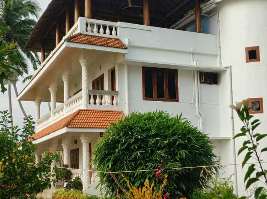 Palm tree yogashala in kerala best Yoga shala in Trivandrum Sea view yoga shala in Trivandrum kerala